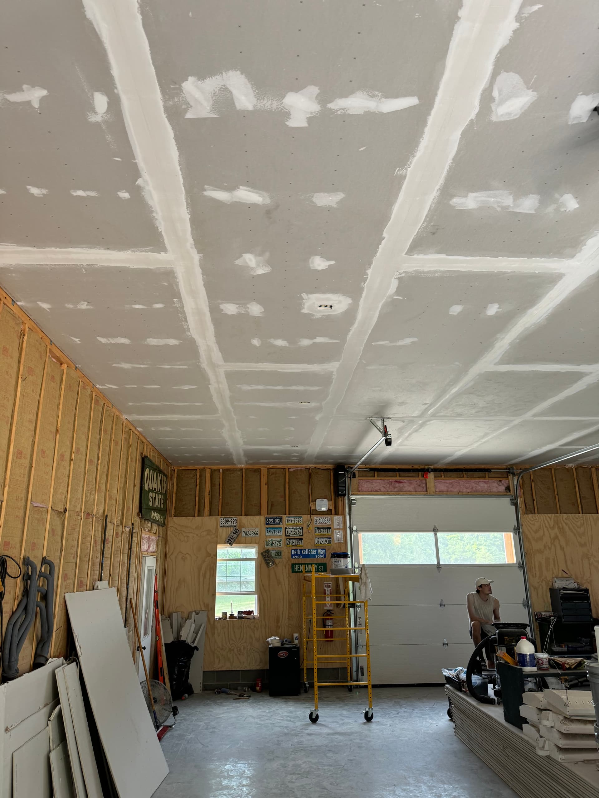 Detached garage ceiling with taped and coated drywall seams